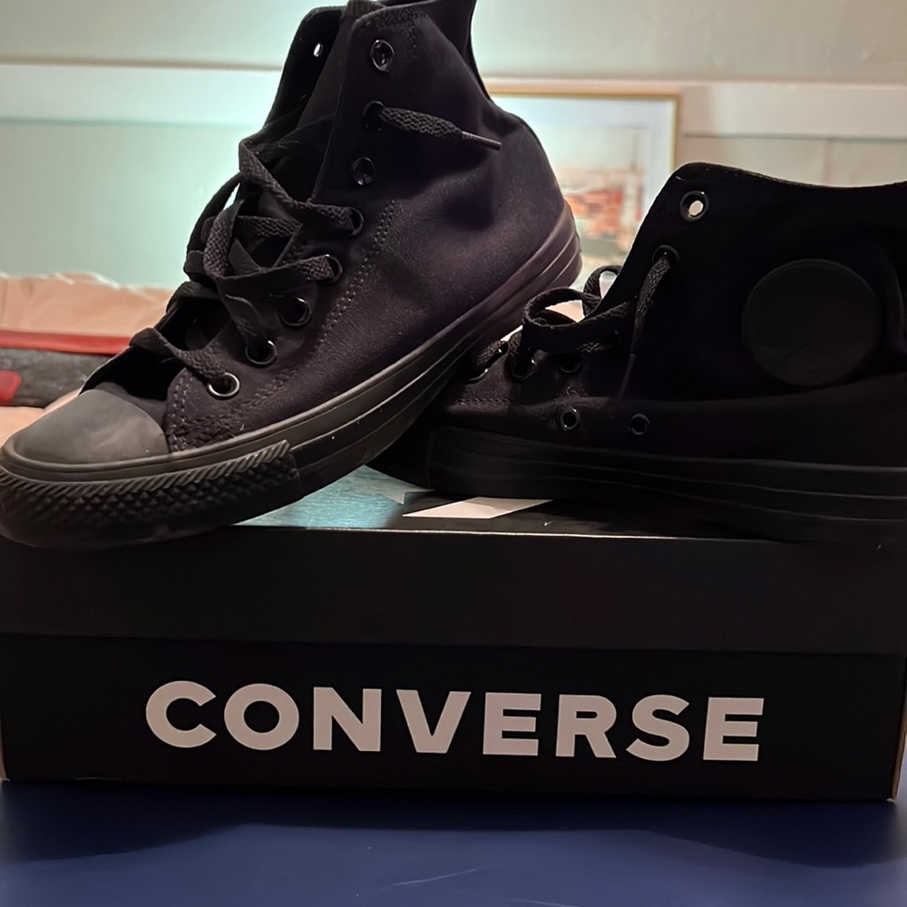 All black converse. Worn once. Has original box.